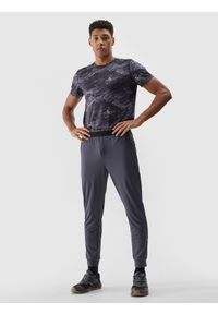 4f - Spodnie treningowe szybkoschnące męskie - szare. Kolor: szary. Materiał: skóra, materiał, syntetyk, elastan, dzianina, włókno. Wzór: jednolity, ze splotem. Sport: fitness