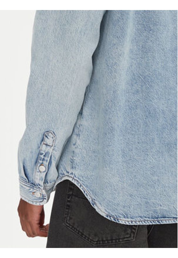 Tommy Jeans Koszula jeansowa DM0DM21362 Niebieski Regular Fit. Kolor: niebieski. Materiał: bawełna