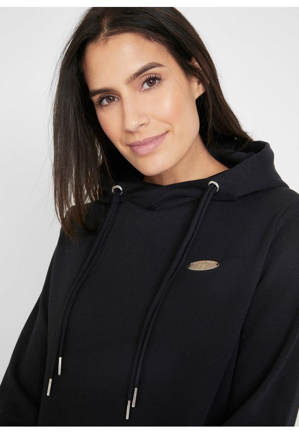 bonprix - Sukienka dresowa z kapturem. Typ kołnierza: kaptur. Kolor: czarny. Materiał: dresówka. Styl: elegancki