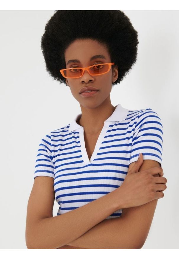 Sinsay - Crop top w prążki - wielobarwny. Materiał: materiał, prążkowany. Wzór: prążki