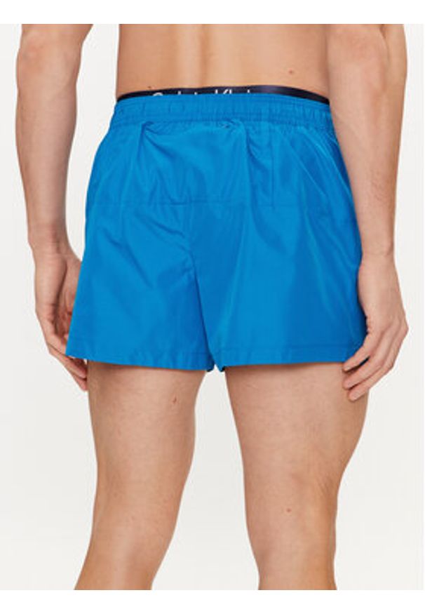Calvin Klein Swimwear Szorty kąpielowe KM0KM00947 Niebieski Regular Fit. Kolor: niebieski. Materiał: syntetyk