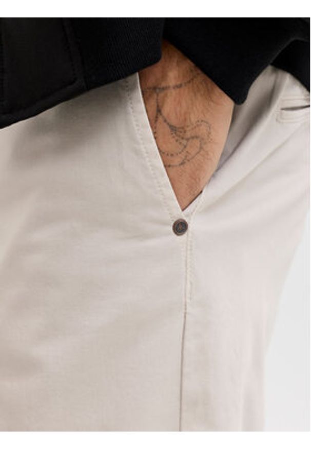 Jack & Jones Chinosy Lie Vance 12292970 Écru Regular Fit. Materiał: bawełna