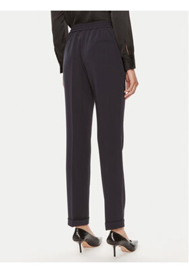 BOSS - Boss Spodnie materiałowe Tariyanah 50490039 Granatowy Regular Fit. Kolor: niebieski. Materiał: syntetyk