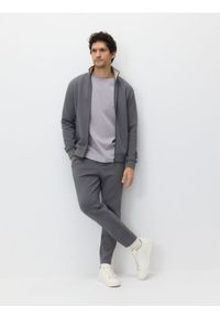Reserved - Spodnie dresowe slim - ciemnoszary. Kolor: szary. Materiał: dresówka