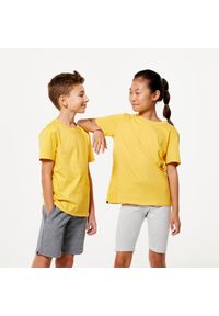 DOMYOS - Koszulka z krótkim rękawem dziecięca Domyos. Kolor: żółty. Materiał: tkanina, prążkowany, bawełna, materiał. Długość rękawa: krótki rękaw. Długość: krótkie