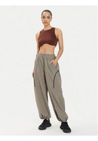 Under Armour Spodnie dresowe Ua Unstoppable Airvent Parachute Pant 1382740-200 Szary Loose Fit. Kolor: szary. Materiał: syntetyk