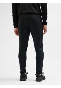 Hummel - SPODNIE hmlESSENTIAL TRAINING PANTS. Kolor: czarny
