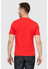 Aeronautica Militare - AERONAUTICA MILITARE Pomarańczowy t-shirt męski z aksamitnym logo. Kolor: pomarańczowy