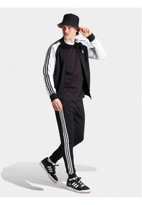 Adidas - adidas Spodnie dresowe adicolor Classics SST IL2488 Czarny Slim Fit. Kolor: czarny. Materiał: bawełna