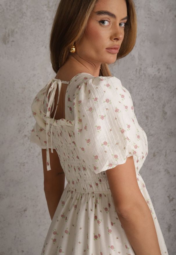 Renee - Jasnobeżowa Rozkloszowana Sukienka z Tencelu w Stylu Baby Doll w Kwiatowy Print Harele. Okazja: na co dzień. Kolor: beżowy. Wzór: nadruk, kwiaty. Typ sukienki: rozkloszowane. Materiał: poliester. Długość rękawa: krótki rękaw. Sezon: lato. Styl: casual. Długość: mini