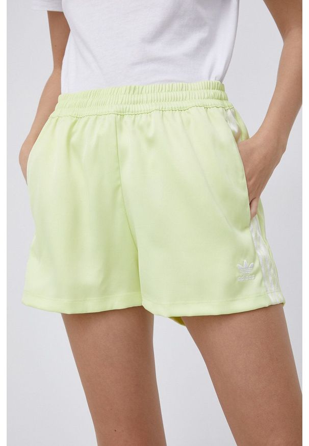 adidas Originals Szorty H37807 damskie gładkie high waist. Stan: podwyższony. Kolor: żółty. Materiał: materiał, tkanina. Wzór: gładki