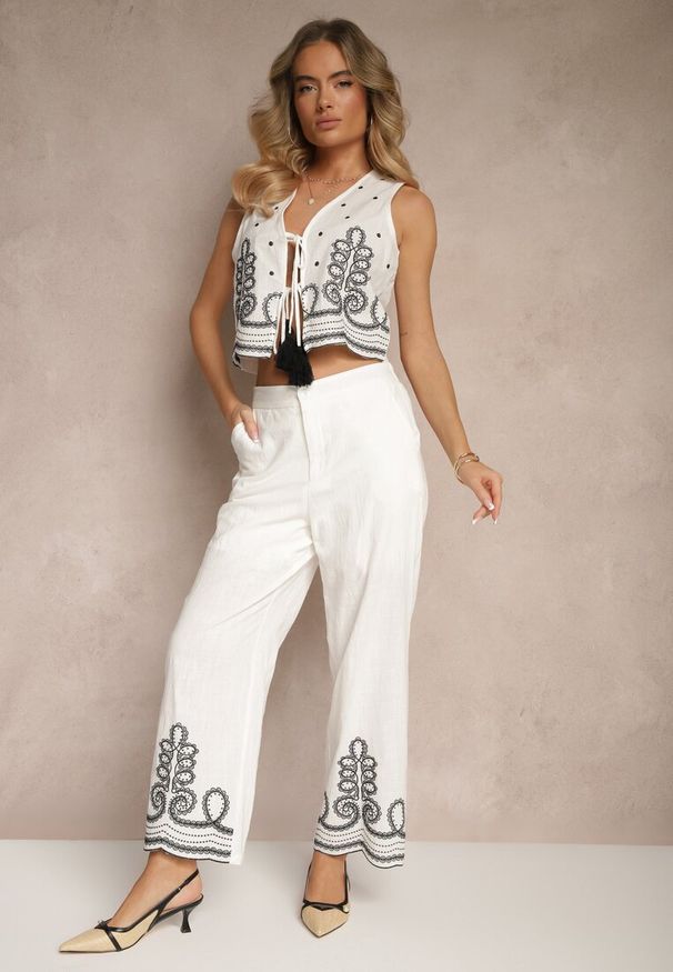 Renee - Biało-Czarne Spodnie z Bawełny o Szerokim Kroju High Waist Ozdobione Haftem Fenoriela. Okazja: na co dzień. Stan: podwyższony. Kolor: biały. Materiał: bawełna. Wzór: haft, aplikacja. Styl: elegancki, casual, boho
