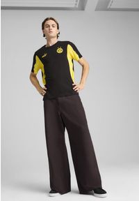 Puma - Męska koszulka Borussia Dortmund ftblARCHIVE PUMA Black Faster Yellow. Kolor: czarny, wielokolorowy, żółty. Wzór: aplikacja