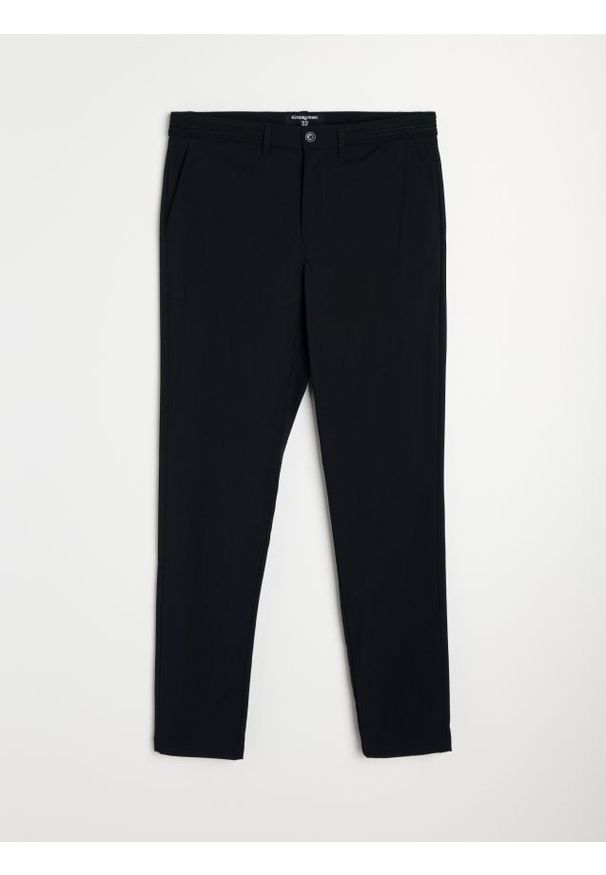 Sinsay - Spodnie chino slim fit z domieszką wiskozy - granatowy. Kolor: niebieski. Materiał: wiskoza