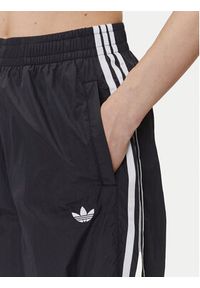 Adidas - adidas Spodnie dresowe adicolor Teamgeist JD0256 Czarny Oversize. Kolor: czarny. Materiał: syntetyk