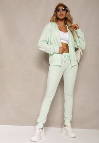 Renee - Miętowe Dresowe Spodnie o Klasycznym Fasonie z Gumką w Pasie Ivemia. Okazja: na co dzień, do pracy, na spotkanie biznesowe. Stan: podwyższony. Kolor: miętowy. Materiał: dresówka. Styl: klasyczny #1