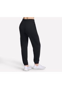 skechers - Spodnie Skechers Delight Jogger, Kobiety. Kolor: czarny. Materiał: materiał, bawełna. Sport: fitness