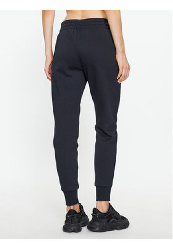 Under Armour Spodnie dresowe Ua Rival Fleece Jogger 1379438 Czarny Loose Fit. Kolor: czarny. Materiał: bawełna