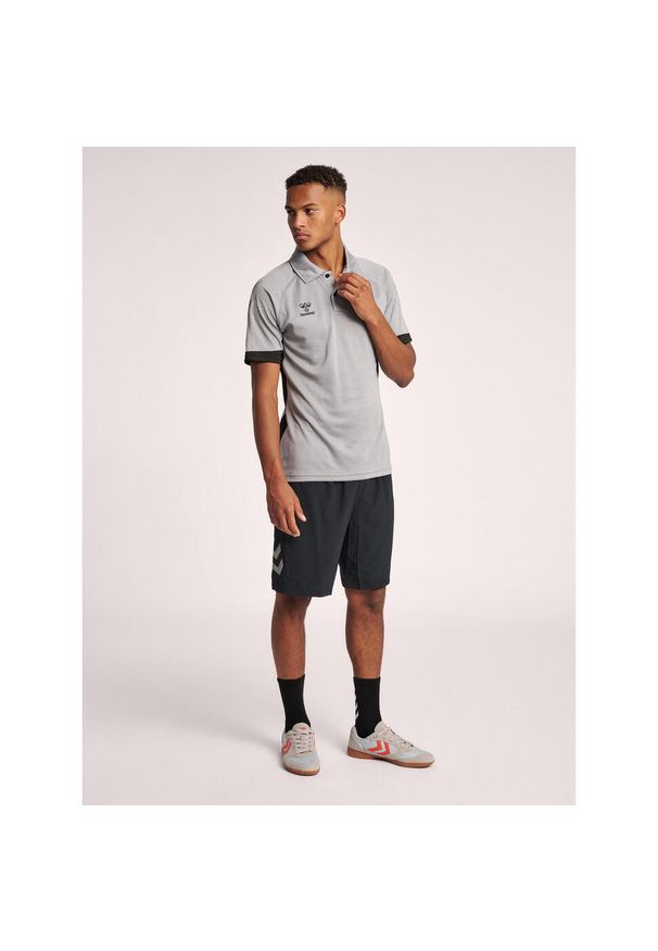 Polo Hummel Lead Functional. Typ kołnierza: polo. Kolor: szary. Materiał: tkanina, dzianina, prążkowany. Wzór: aplikacja, nadruk. Styl: elegancki