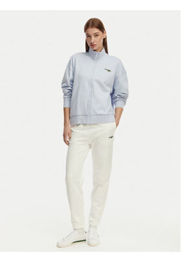 Lacoste Spodnie dresowe XF7604 Biały Regular Fit. Kolor: biały. Materiał: bawełna