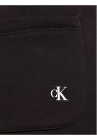 Calvin Klein Jeans Spodnie dresowe Logo IU0IU00604 Czarny Regular Fit. Kolor: czarny. Materiał: bawełna #9