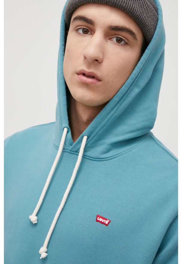 Levi's® - Levi's bluza bawełniana męska kolor zielony z kapturem gładka. Okazja: na spotkanie biznesowe, na co dzień. Typ kołnierza: kaptur. Kolor: zielony. Materiał: bawełna. Wzór: gładki. Styl: casual, biznesowy