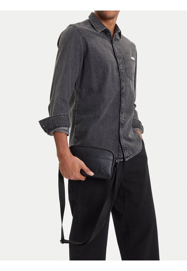 Calvin Klein Saszetka Ck Camera Bag LV04D3247G Czarny. Kolor: czarny. Materiał: skóra