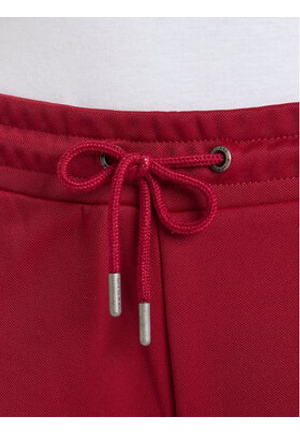 Guess Spodnie dresowe W5BB58 FL04W Bordowy Regular Fit. Kolor: czerwony. Materiał: syntetyk
