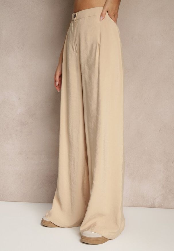 Renee - Beżowe Spodnie Low Waist z Modalu z Szeroką Nogawką Reanelira. Okazja: na co dzień. Stan: obniżony. Kolor: beżowy. Styl: klasyczny, casual, elegancki
