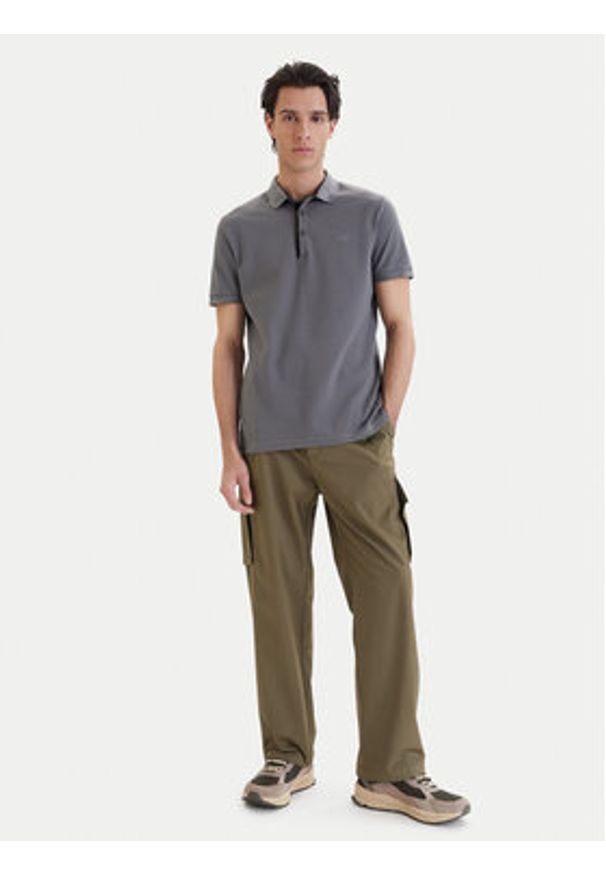 The North Face Polo PREMIUM SLIM Szary Slim Fit. Typ kołnierza: polo. Kolor: szary. Materiał: bawełna