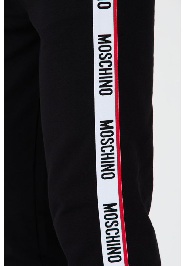 MOSCHINO Czarne męskie spodnie dresowe z lampasami, Rozmiar L. Kolor: czarny. Materiał: dresówka