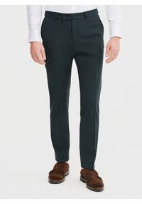 Pako Lorente - PAKO LORENTE – Wełniane spodnie garniturowe w kolorze zielonym. Okazja: na spotkanie biznesowe. Kolor: zielony. Materiał: wełna. Styl: elegancki, biznesowy