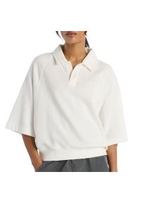 Koszulka damska New Balance WT611044SST - biała. Kolor: biały. Materiał: materiał, bawełna, poliester. Długość rękawa: krótki rękaw. Długość: krótkie. Wzór: haft, aplikacja #1