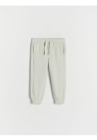Reserved - Spodnie jogger - jasnozielony. Kolor: zielony. Materiał: dzianina, bawełna #1