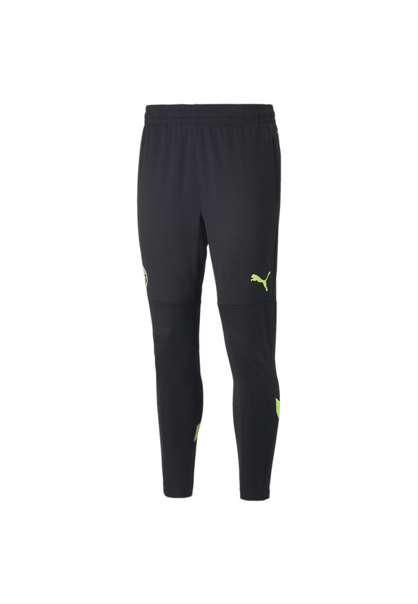 Puma - Trening joggingu Manchester City 2022/23. Kolor: wielokolorowy, żółty, czarny, zielony. Sport: bieganie, fitness