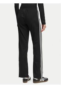 Adidas - adidas Spodnie dresowe Firebird Classic KD5575 Czarny Regular Fit. Kolor: czarny. Materiał: syntetyk #2