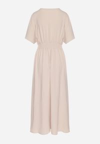 Born2be - Jasnobeżowa Rozkloszowana Sukienka z Gumką w Talii i Dekoltem w Serek Iffara. Okazja: na co dzień, na spotkanie biznesowe, do pracy. Typ kołnierza: dekolt w serek. Kolor: beżowy. Styl: biznesowy, casual #2