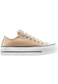 Buty sportowe Converse Chuck Taylor All Star Lift Platform Polka Dots. Kolor: beżowy. Materiał: materiał. Obcas: na platformie. Styl: sportowy #1