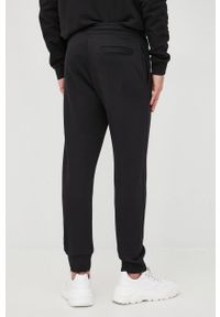 Armani Exchange spodnie dresowe bawełniane męskie kolor czarny gładkie. Kolor: czarny. Materiał: bawełna, dresówka. Wzór: gładki