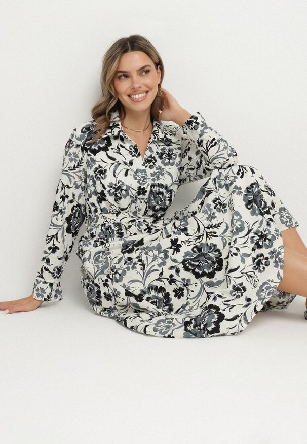 Born2be - Niebieska Sukienka Koszulowa z Wiskozy w Kwiaty z Wiązanym Paskiem Lorkia. Okazja: na co dzień. Kolor: niebieski. Materiał: wiskoza. Długość rękawa: długi rękaw. Wzór: kwiaty. Sezon: wiosna, lato. Typ sukienki: koszulowe. Styl: klasyczny, casual, elegancki