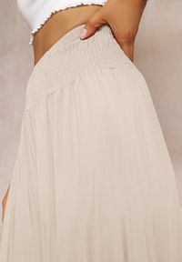 Renee - Jasnobeżowe Szerokie Spodnie High Waist o Długości 7/8 Rathi. Stan: podwyższony. Kolor: beżowy. Materiał: wiskoza, tkanina