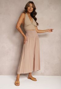 Renee - Beżowe Plisowane Spodnie Szerokie z Bawełny Jaina. Okazja: do pracy, na spotkanie biznesowe. Stan: podwyższony. Kolor: beżowy. Materiał: bawełna. Styl: elegancki, biznesowy