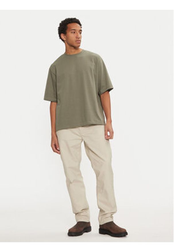 Calvin Klein Jeans Spodnie materiałowe J30J326263 Beżowy Straight Fit. Kolor: beżowy. Materiał: syntetyk