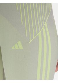Adidas - adidas Legginsy Seamless Branded IA1940 Szary Tight Fit. Kolor: szary. Materiał: syntetyk