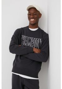 Champion bluza 217169 męska kolor czarny z aplikacją. Okazja: na co dzień. Kolor: czarny. Materiał: włókno, dzianina. Wzór: aplikacja. Styl: casual #1
