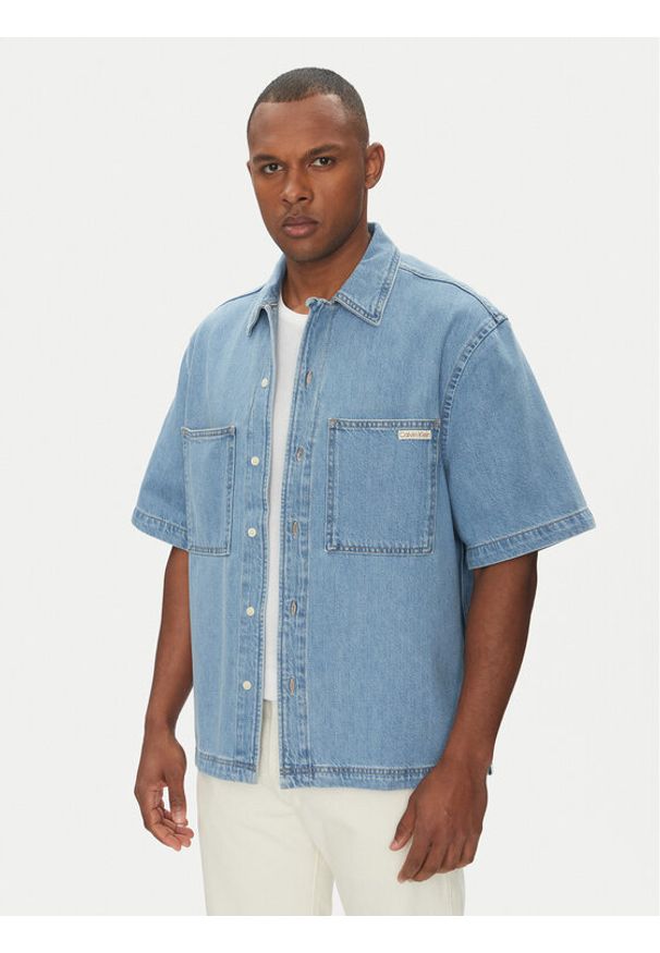 Calvin Klein Jeans Koszula jeansowa Bowler J30J327512 Niebieski Relaxed Fit. Kolor: niebieski. Materiał: bawełna