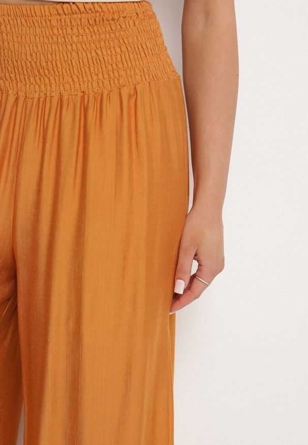 Born2be - Pomarańczowe Wiskozowe Szerokie Spodnie z Wysokim Stanem Orrilia. Okazja: na co dzień. Stan: podwyższony. Kolor: pomarańczowy. Materiał: wiskoza. Styl: elegancki, klasyczny, casual