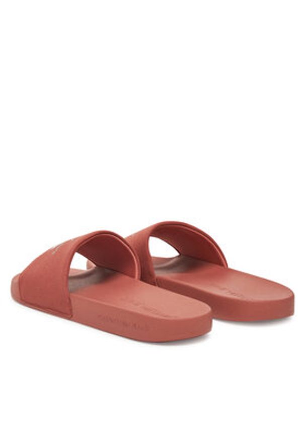 Calvin Klein Jeans Klapki Slide Monogram Cv YM0YM01271 Koralowy. Kolor: pomarańczowy. Materiał: materiał