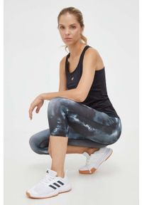 Reebok legginsy treningowe Identity kolor czarny wzorzyste. Kolor: czarny. Materiał: skóra, materiał #1