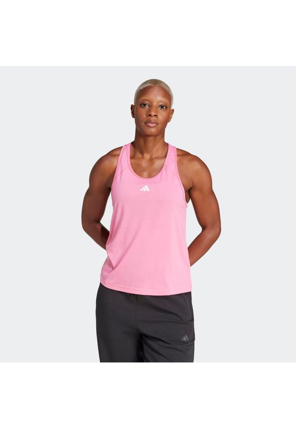 Adidas - Koszulka fitness damska ADIDAS bez rękawów. Kolor: różowy. Materiał: skóra, materiał. Długość rękawa: bez rękawów. Sport: fitness